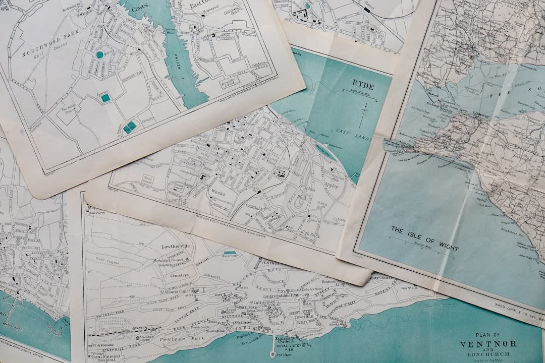 Geospatial professional working with GIS consulting services on a digital map