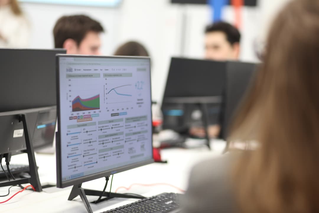 GIS analyst working at a computer